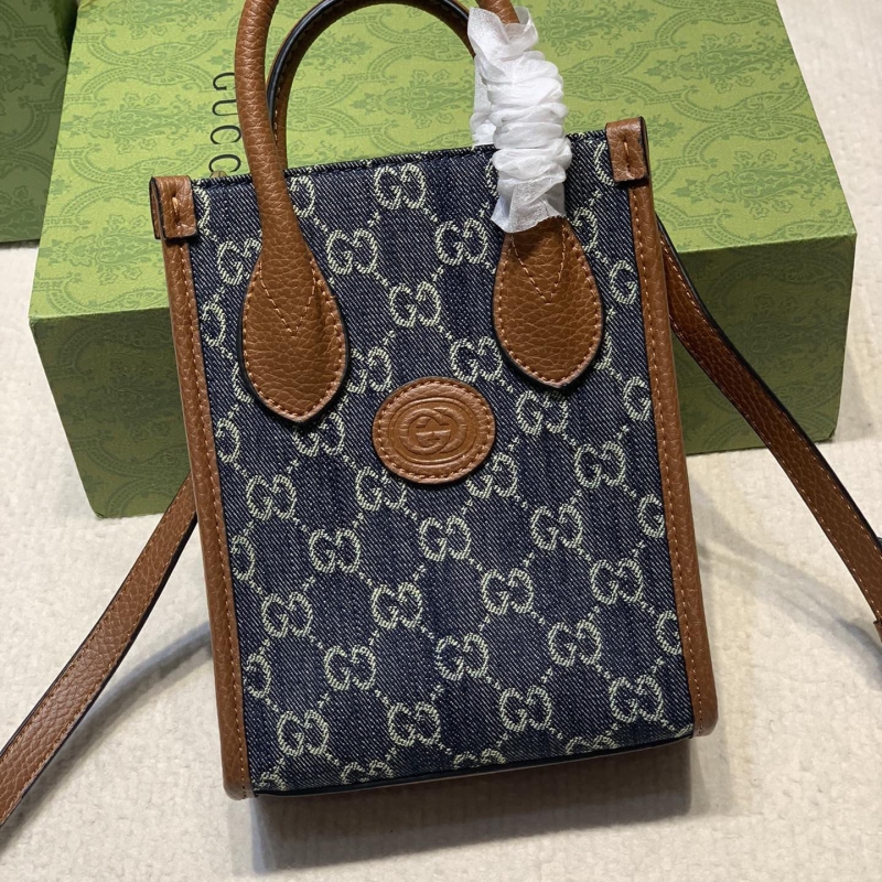 G*u*i top handle bags